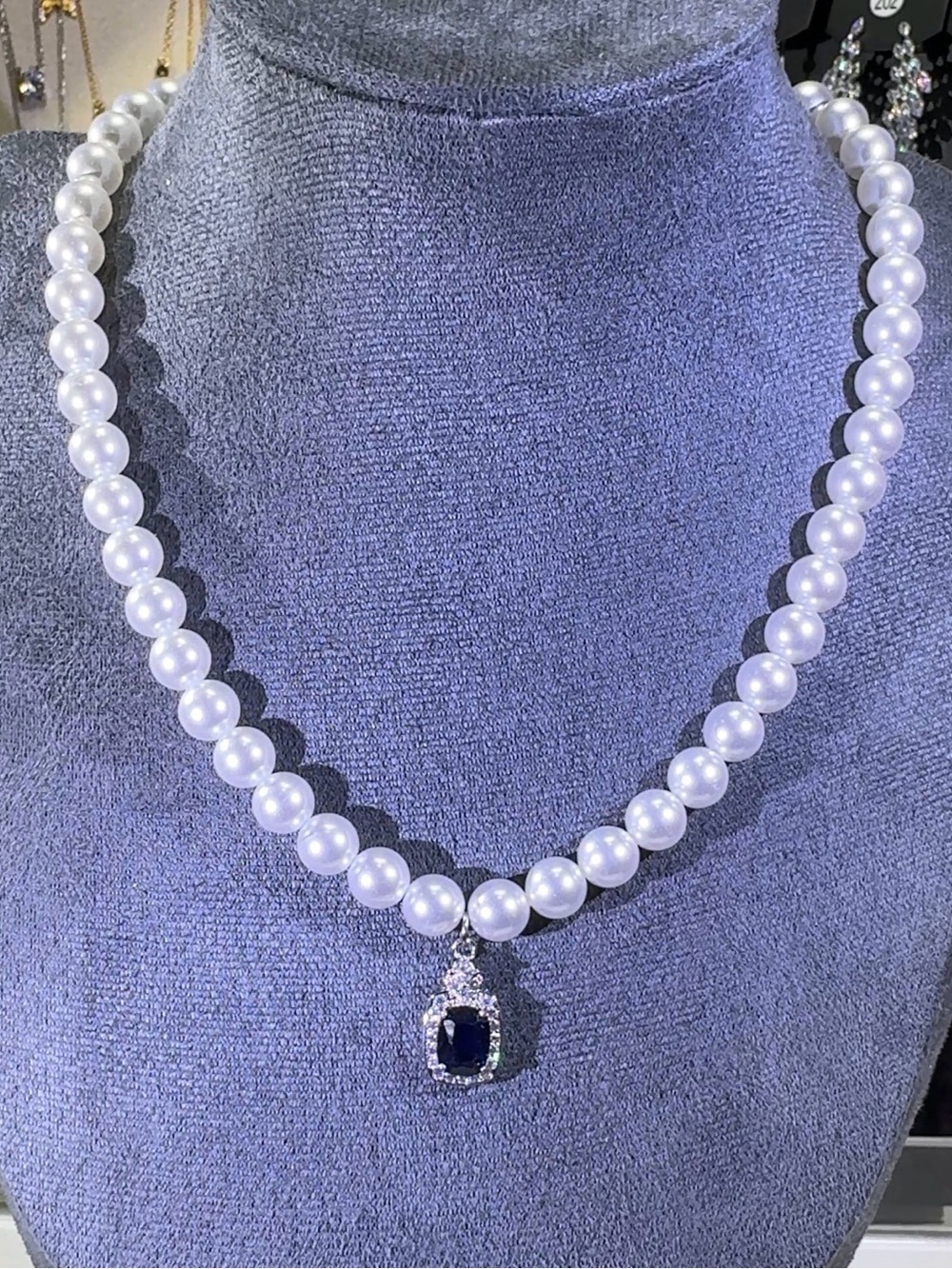 Shell-Pearl Necklace with Sapphire Pendant